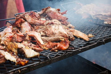 Pork meat grilled in open fire