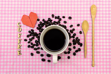 Cup of coffee with coffee bean