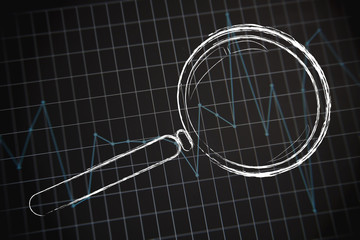 magnifying glass focusing on business performance graph
