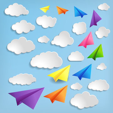Paper airplanes with clouds on blue background