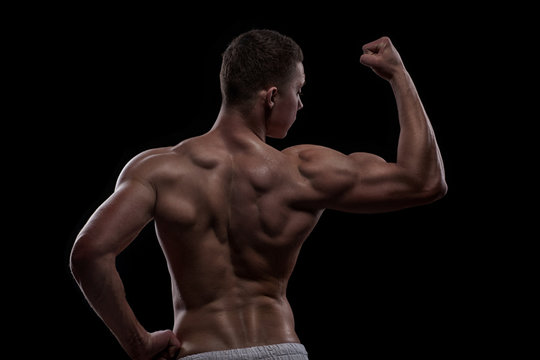 young athlete bodybuilder from back