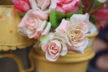 Beautiful vintage roses of artificial flowers