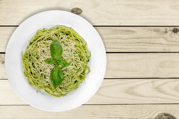 Pasta. Italian pasta spaghetti with pesto sauce and basil leaf