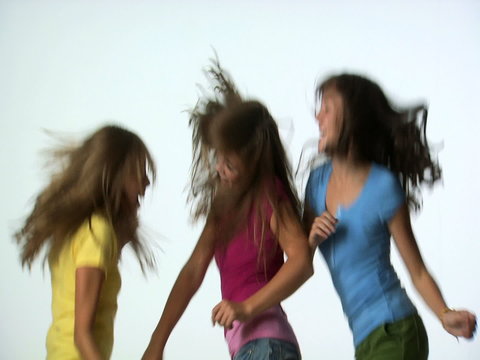 Three girls dancing