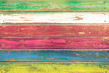 Naklejka premium Multicolored wood background and vintage wallpaper pattern