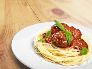 Spaghetti. Seving of spaghetti with meatballs