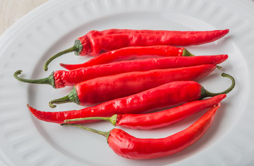 Red Hot Chili Peppers on a white wooden table