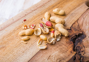 Peanuts on the old kitchen board