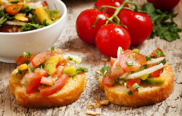 Italian bruschetta with tomato, onion and bell petsem, sample fo