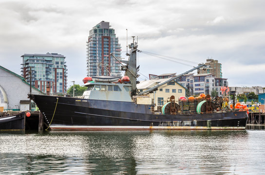 Fishing Boat in Harbour and Cloudy Sky