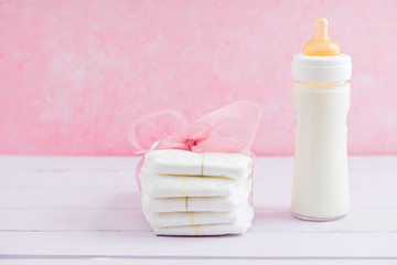 Baby milk bottle and diapers