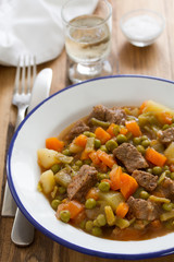 meat with carrot, peas and potato