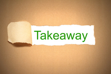 brown paper torn to reveal takeaway
