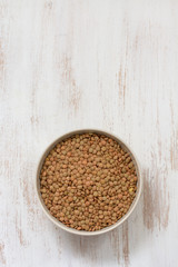 Obraz na płótnie Canvas lentil in bowl on white background