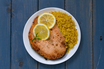 fried fish with asparagus and lemon