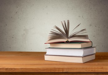 Book. Vintage old books on wooden deck table and grunge