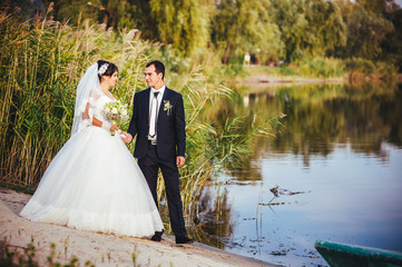 wedding: bride and groom on the seashore.