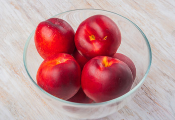 Nectarines in a glass bowl