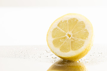 Fresh lemon on metal table