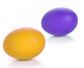 Multicolor eggs on white background