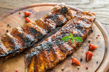Grilled pork ribs on the wooden board