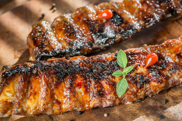 Grilled pork ribs on the wooden board