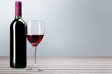 Wine Bottle. Red wine bottle and glass, isolated on white