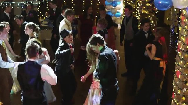 MS CS R/F Couples dancing on prom night under disco ball / Cedar Hills, Utah, USA