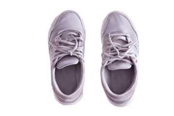Pair of Worn White Sneakers on White Background