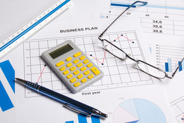 business plan with graphs, charts and calculator