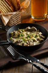 Roast with mushrooms, garlic sauce