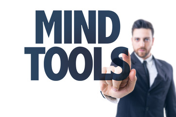 Business man pointing the text: Mind Tools