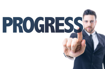 Business man pointing the text: Progress