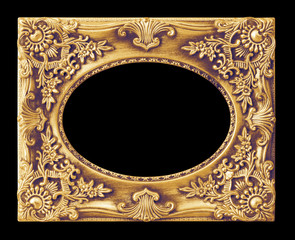 The antique gold frame on the black background