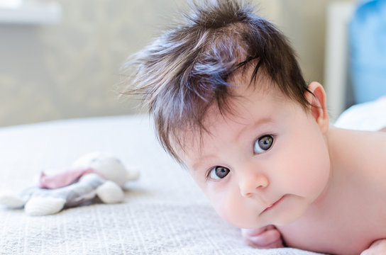 Portrait of cute sweet little newborn baby girl