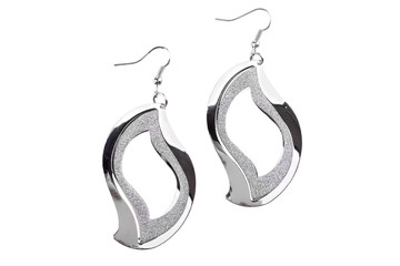 Pair of silver earrings isolated on white background