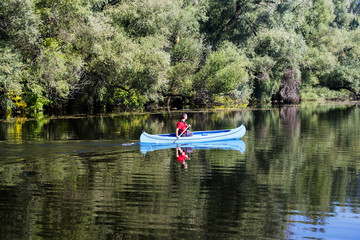 Young man in canoe