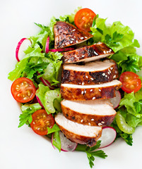 Fresh vegetable salad with grilled chicken breast