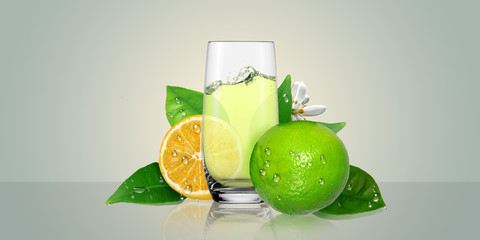 Lemon juice glass and lime fruit.