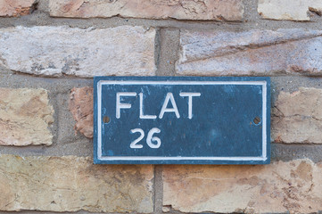 Flat Number 26 sign