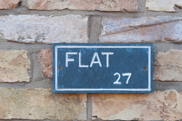 Flat Number 27 sign