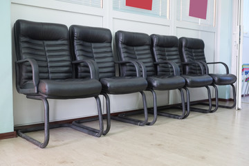 Leather chairs in a row