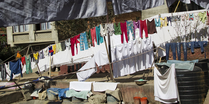 Different clothes drying on a rope in Kathmandu, Nepal