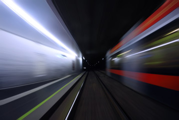 Fototapeta na wymiar Blured underground train and platform lights