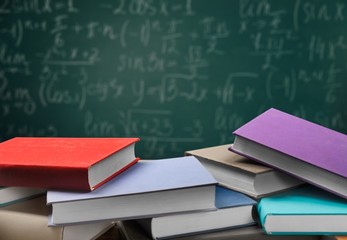 Child. Child against the rain of numbers and letters with a book