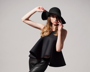 Fashion woman model in black dress