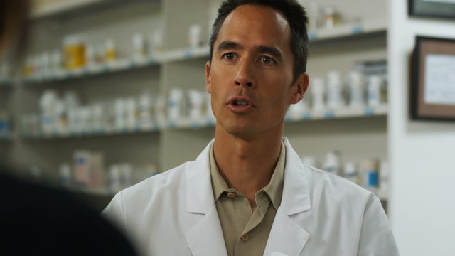 pharmacist explaining prescription