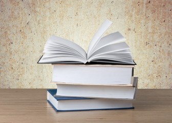 Book. A pile of books with library on the back