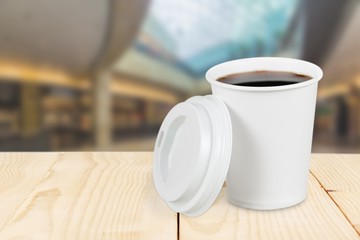 Cup. Opened take-out coffee with cup holder. Isolated on a white