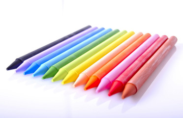 Colored pencils on white background